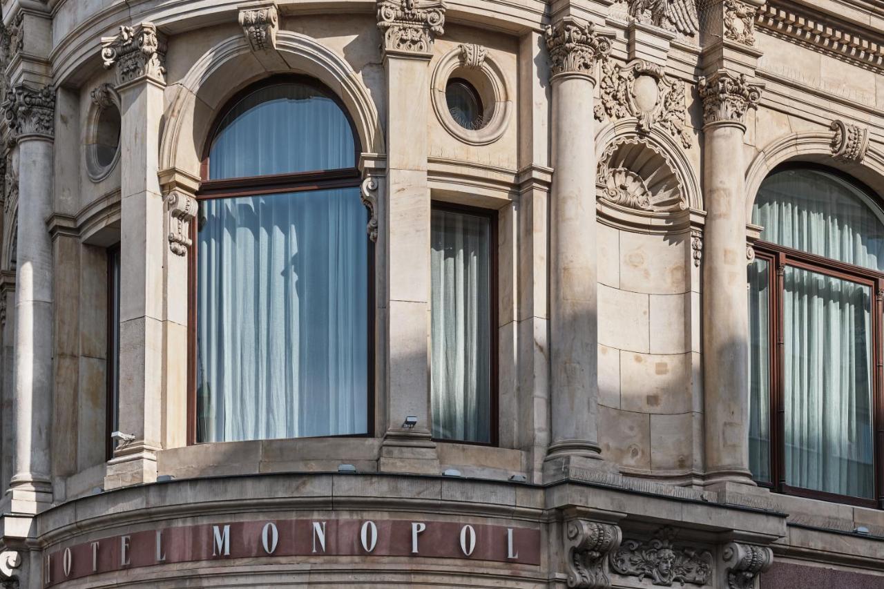 Hotel Monopol Wroclaw Luaran gambar The hotel's name on the front of the building